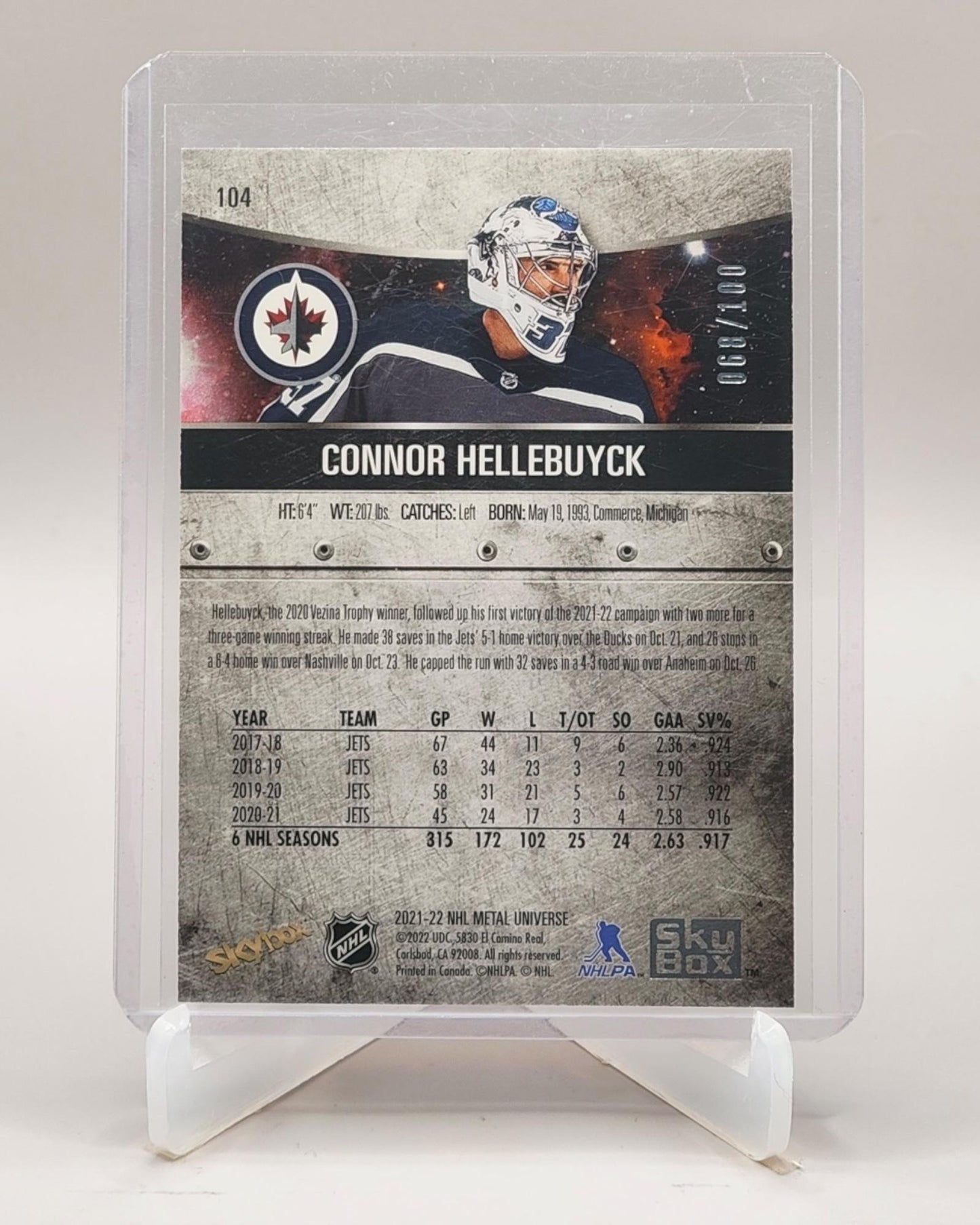 2021-22 SkyBox Metal Universe #104 Connor Hellebuyck PMG Red #/100