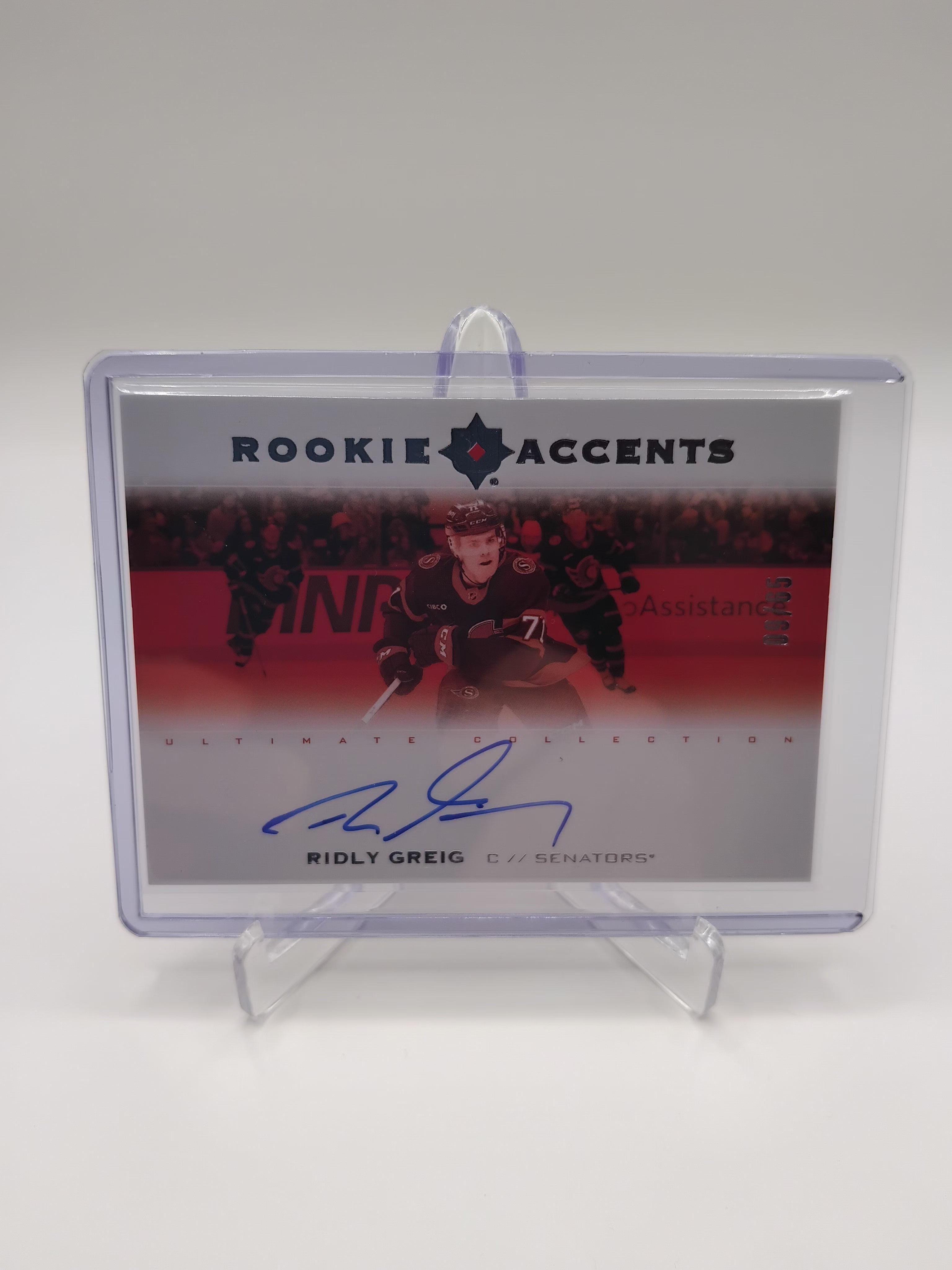 2023-24 Ultimate Collection Ridley Greig Rookie Accents Auto 09/65