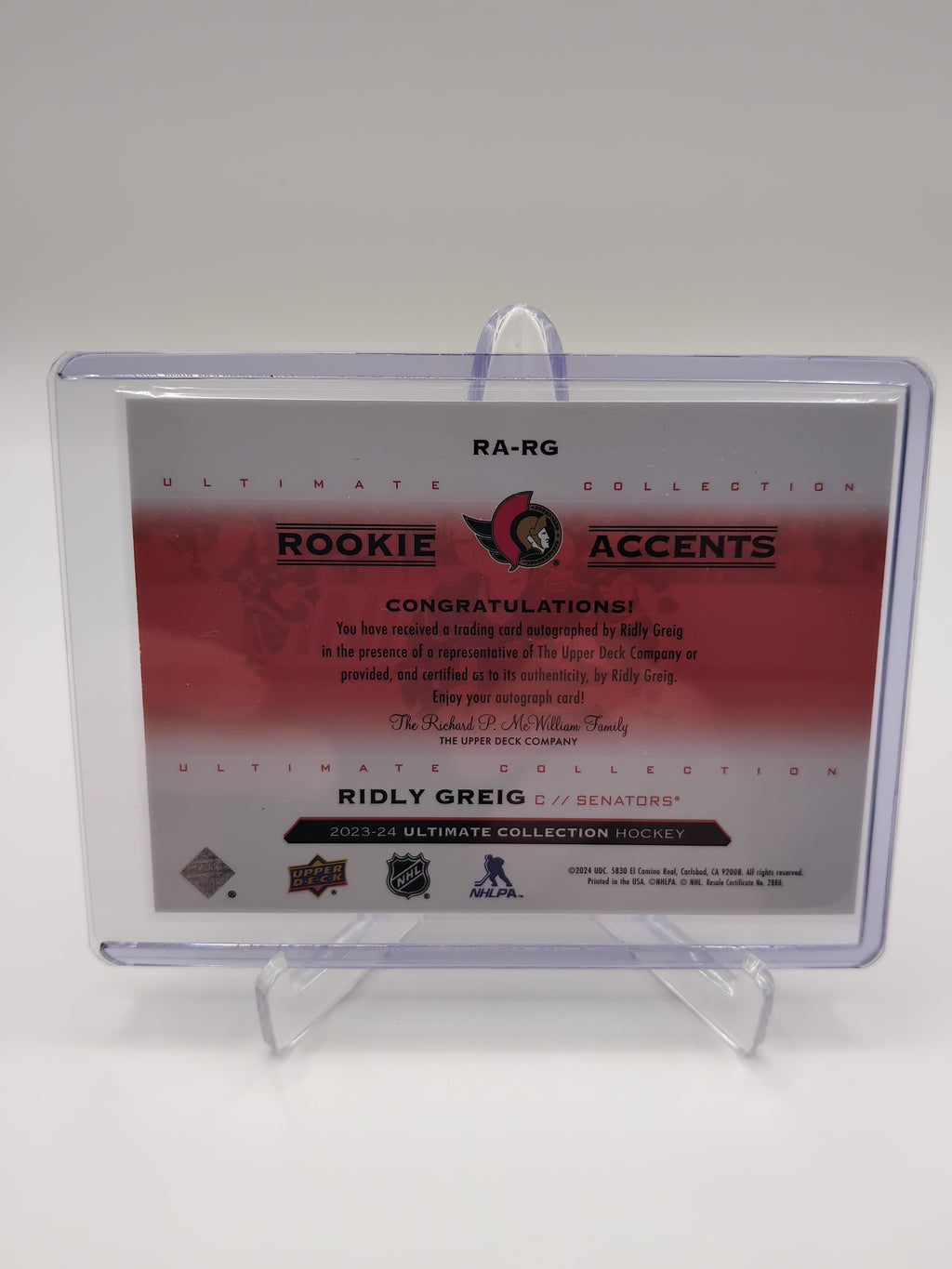 2023-24 Ultimate Collection Ridley Greig Rookie Accents Auto 09/65