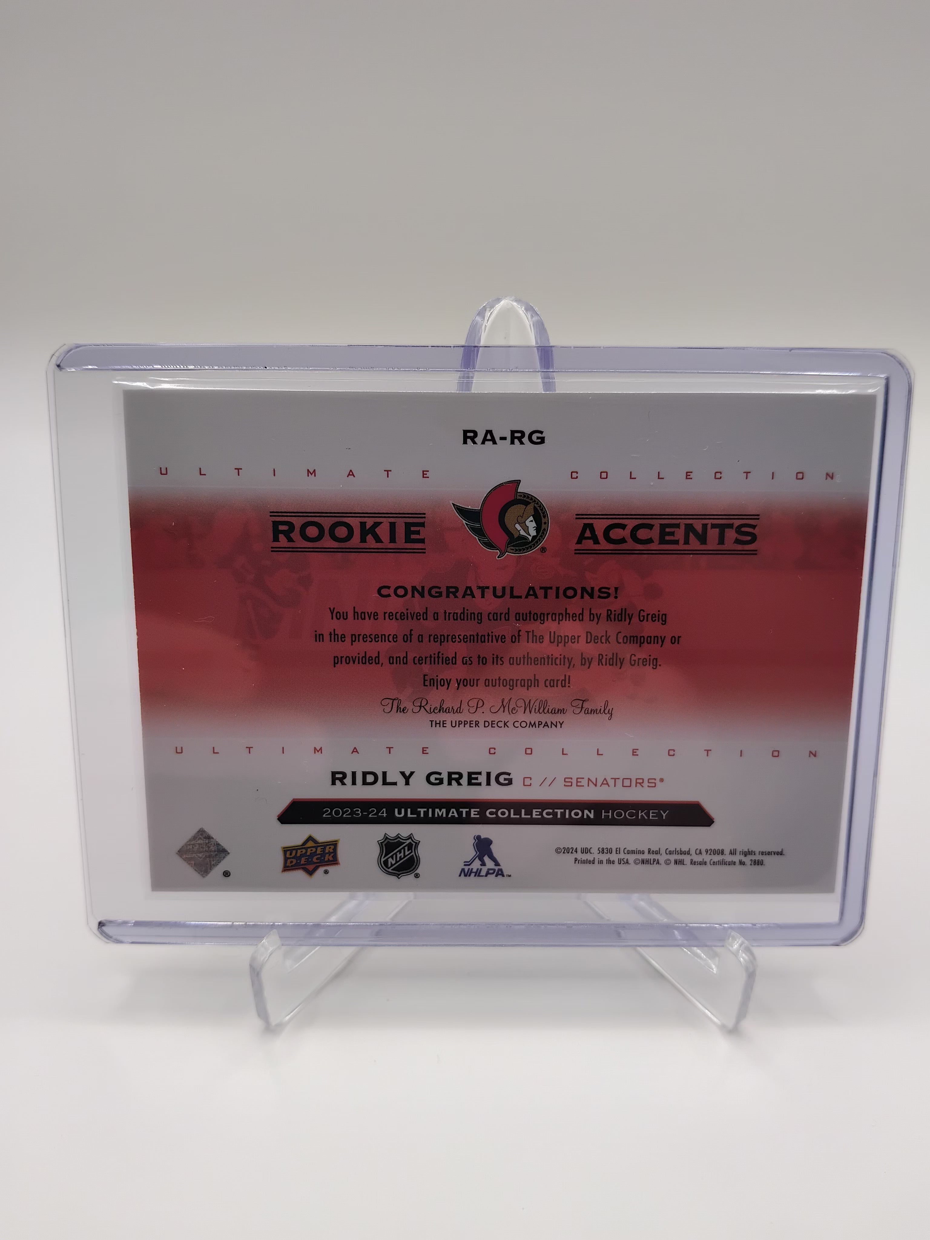 2023-24 Ultimate Collection Ridley Greig Rookie Accents Auto 09/65
